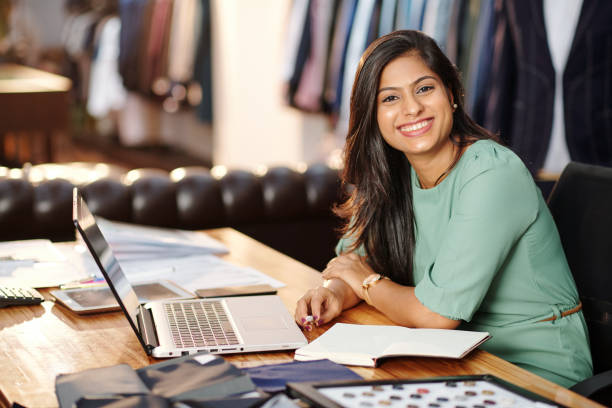 istock Happy young Indian atelier owner 1273810507