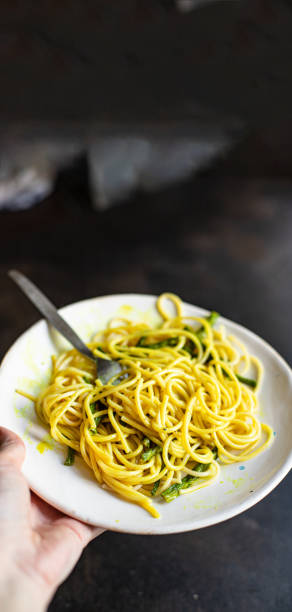 istock pasta spaghetti green bean asparagus sauce noodles second course vegetarian serving size top view copy space for text food background rustic 1273812179