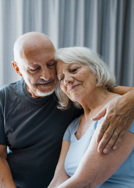 istock Senior husband supporting sad female in bedroom 1273813445