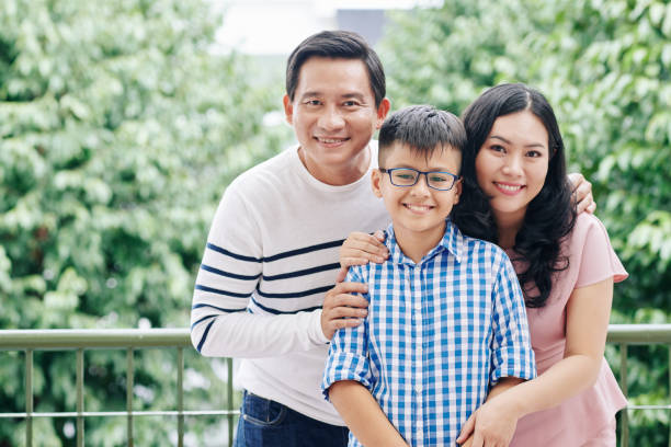 istock Happy Vietnamese family 1273814087