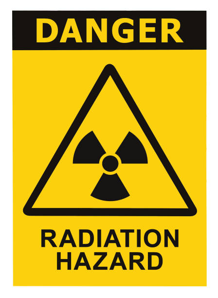 istock Radiation hazard danger text sign label, radhaz threat alert symbol icon, black yellow triangle signage, isolated vertical macro closeup 1273818165