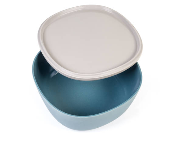 istock Empty salad bowl with inverted lid on a white background 1273819775