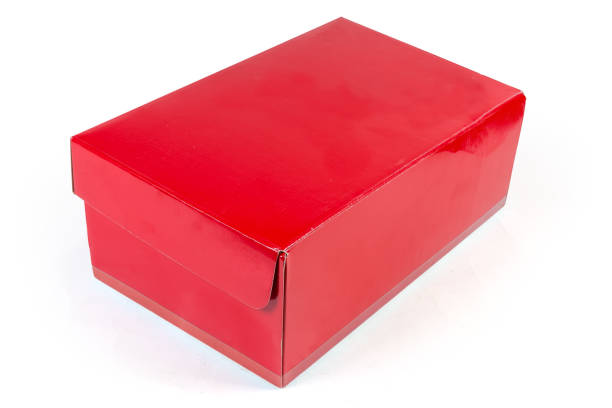 istock Closed red cardboard shoe box on a white background 1273822404