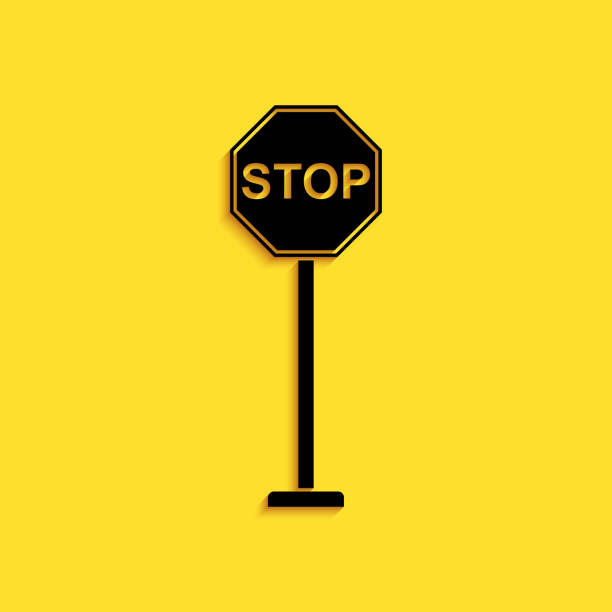 istock Black Stop icon isolated on yellow background. Traffic regulatory warning stop symbol. Long shadow style. Vector 1273822443