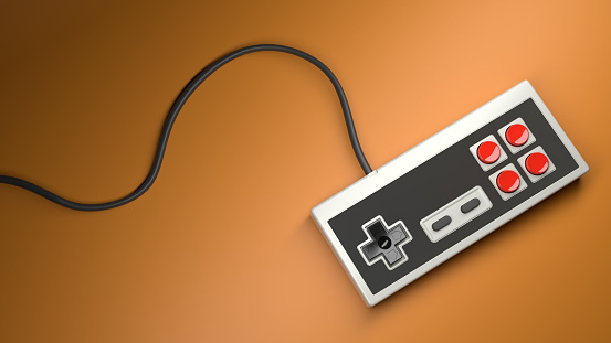 Retro computer gaming controller joystick with red and black buttons on a orange background, concept of vintage rectangular gamepad. 3d render and illustration.