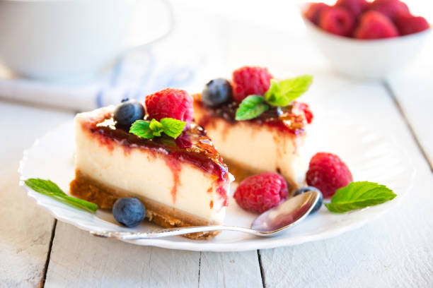 istock Homemade delicious cheesecake with fresh fruit and mint 1273825746