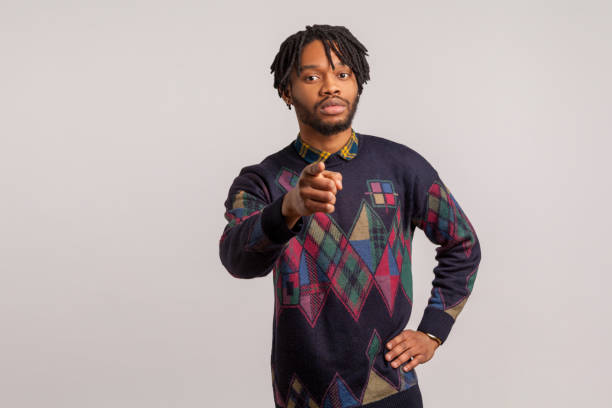 istock You can. Serious bossy african man with beard and dreadlocks pointing finger at camera, motivating and inspiring, commanding 1273827934