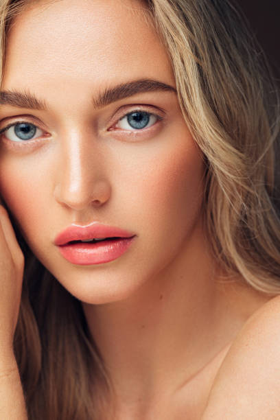 istock Beautiful woman with light make-up 1273829042