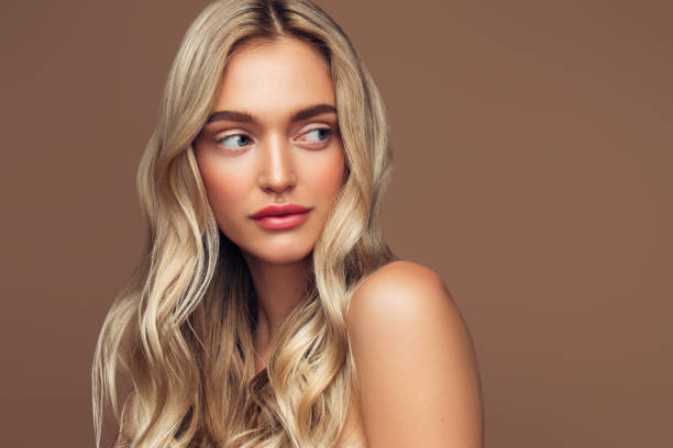 istock Beautiful and excited blond woman 1273829089