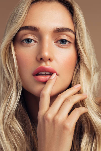 istock Beautiful and excited blond woman 1273829133