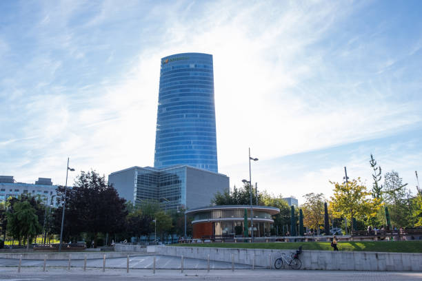 skyscraper in Bilbao, Spain, framed in the stairs of the Ria de Bilbao bridge