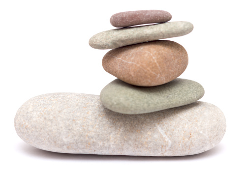 Balancing stones isolated on white background
