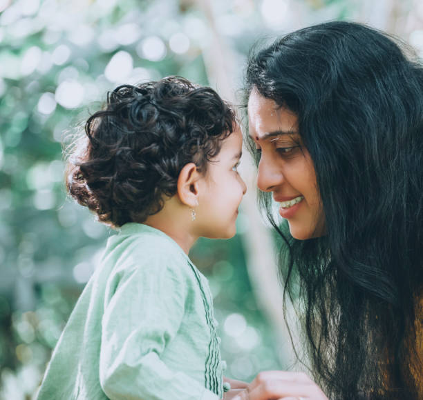 istock Mother And Daughter In Park 1273831710