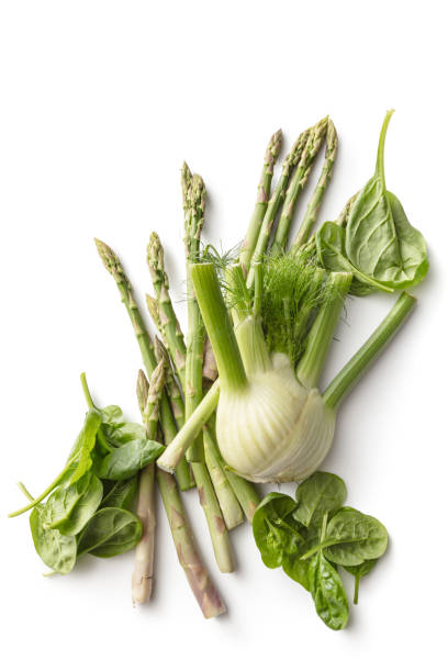 istock Vegetables: Fennel, Asparagus and Spinach Isolated on White Background 1273833477