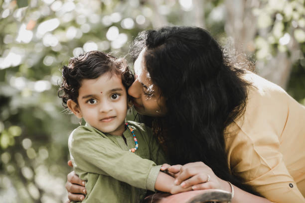 istock Mother And Daughter In Park 1273833512