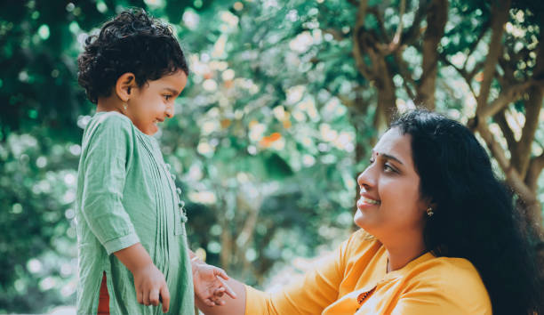 istock Mother And Daughter In Park 1273837790