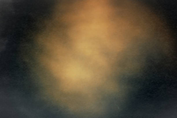 istock Distressed blurred abstract background yellow spot on a dark background 1273839049