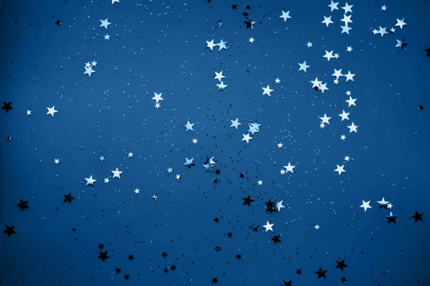 istock Scattered stars on a mint color background 1273839159