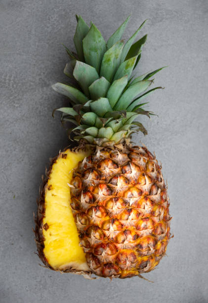istock Ripe pineapple on grey background, isolated tropical fruit 1273840813