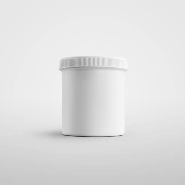 istock Mockup of a plastic white jar standing isolated on background with shadows. 1273841073