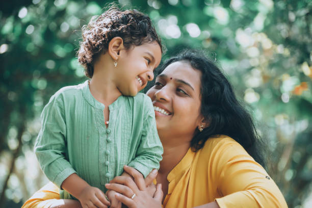 istock Mother And Daughter In Park 1273842474