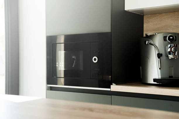 istock A modern and black oven near a coffee machine in the kitchen 1273842832