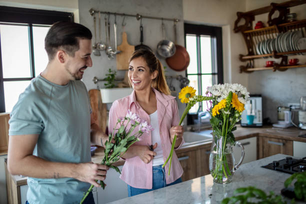 istock Arranging flowers at our home 1273848805