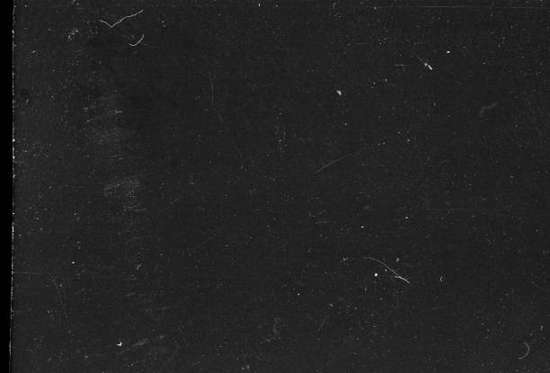 istock Old Scratched Film Strip Grunge Texture Background 1273851166