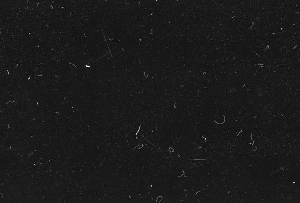 Old Scratched Film Strip Grunge Texture Background A close-up scan of an old scratched 35mm film strip grunge texture background. vintage stock pictures, royalty-free photos & images