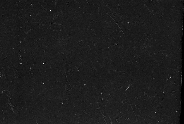 istock Old Scratched Film Strip Grunge Texture Background 1273852680