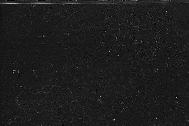 istock Old Scratched Film Strip Grunge Texture Background 1273852719