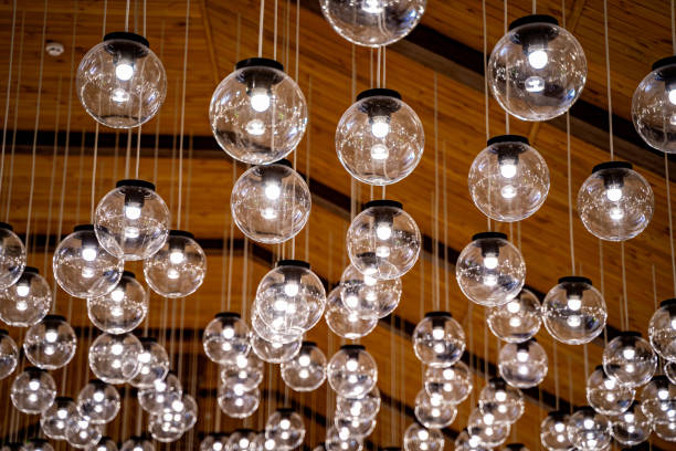 istock Transparent round glass celling lamps. Wooden celling/. Modern design. 1273852815