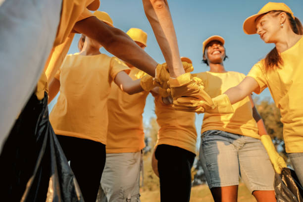 istock Group of volunteer in the park 1273853117