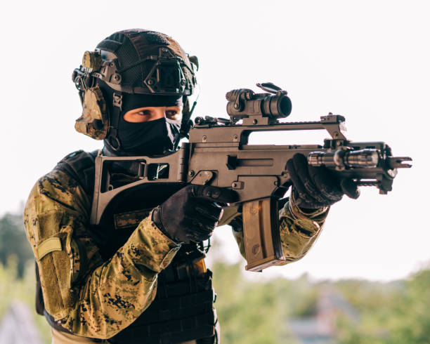 Soldier in Cropat uniform with black belt and plate carrier