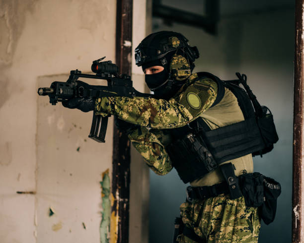 istock Soldier in Cropat uniform with black belt and plate carrier 1273854040