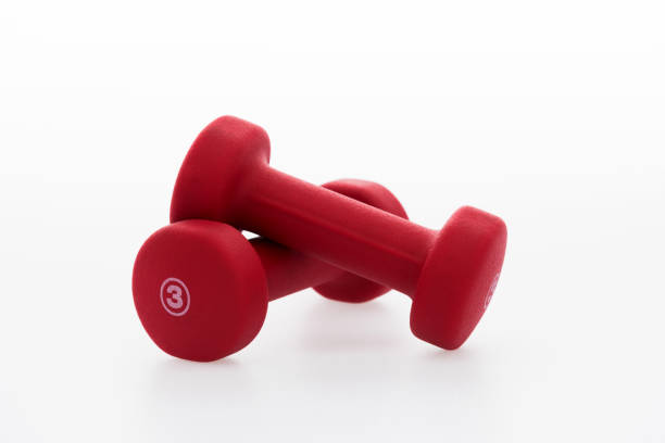 istock A pair of dumbbells on white background 1273857730