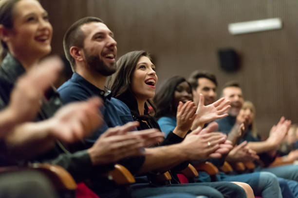 istock Happy audience applauding in the theater 1273857826