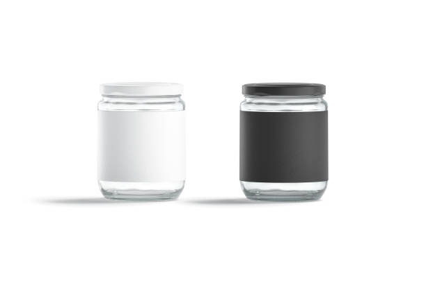 istock Blank glass jar with black and white label mock up 1273857954