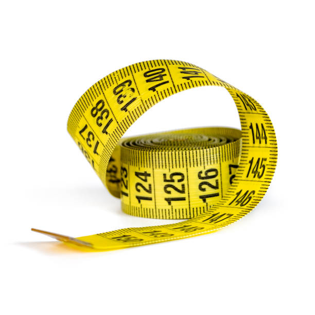 istock Yellow measuring tape isolated on white background 1273857971