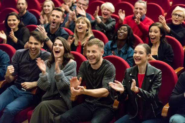 istock Happy audience applauding in the theater 1273859265