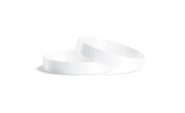 istock Blank white two silicone wristband mockup lying, isolated 1273859611