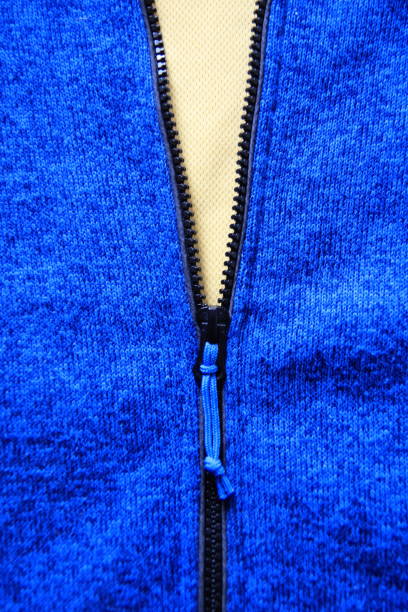istock Zip closure on a blue sweater. Closure on clothing. 1273859771