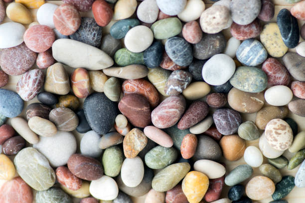 istock White and gray pebbles simple abstract background, simplicity stones one by one 1273866325