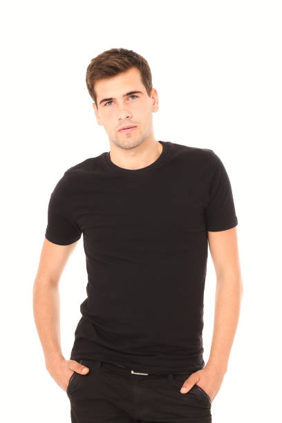 istock Smart thinking young man in black shirt isolated on white. Copy space and selective focus. Mock up 1273869246