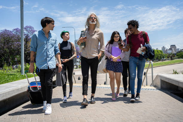 istock Professor taking his small group of students on a field trip 1273875931