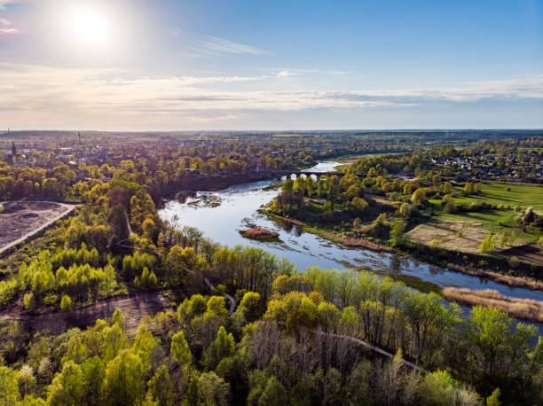 istock Areal countryside view from drone with small river Venta. 1273876074