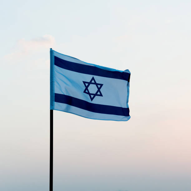 istock Israel's national flag in the wind 1273879095
