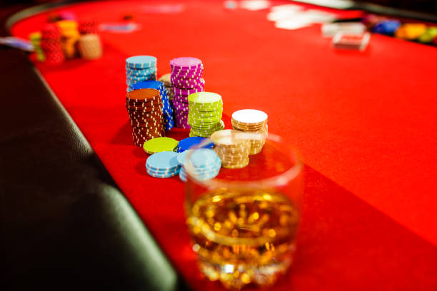 istock Casino roulette table with gambling chips 1273879368