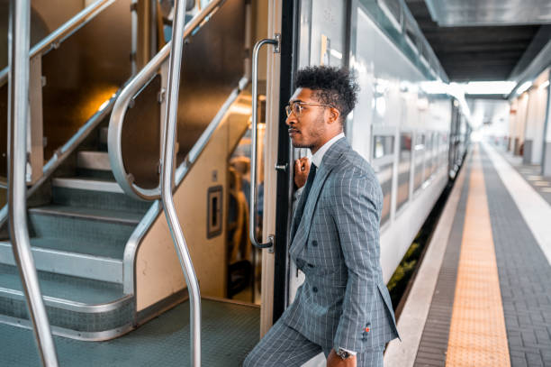 istock Businessman entering to the train. 1273881459
