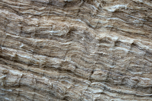 Close-up of roll of fibreglass insulation material